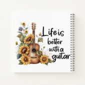 Pas naamgitaar met zonnebloem aan notitieboek (Achterkant)