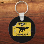 Pas op voor Dinosaur (beschadigd) Sleutelhanger (Voorkant)