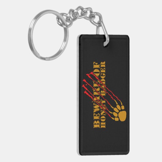 Pas op voor honingbadger sleutelhanger (Voorkant Links)