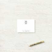 Pas uw zwart-wit bedrijfslogo slogan aan post-it® notes (Op bureau)