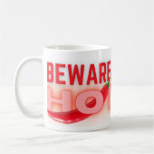 Pas warm op koffiemok (Links)