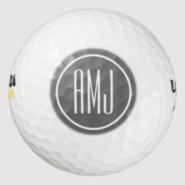 Pas zilvergrijs en wit monogram aan golfballen