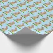 Pasgebak en eieren op blauw cadeaupapier (Hoek)