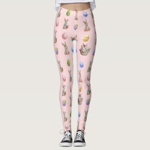 Pasgebaren en gekleurde eieren op roze leggings