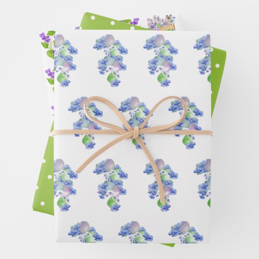 Paspoortjes en -eieren in lavender, blauw en groen inpakpapier vel (In situ)