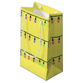 Paspoortlichten op geel klein cadeauzakje (Voorkant Gekanteld)