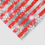 Paspoortwitte sneeuwvlokken op rode en zilverstrip tissuepapier (Detail)