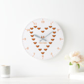 Passie-vlinders in hartvorm dans grote klok (Huis)