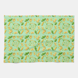 Pasta and basil leaves on green theedoek