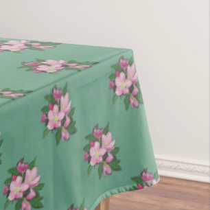 Pastel appelbloemen op groen tafelkleed