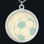 Pastel Blue Voetbal van Chariklia Zarris Zilver Vergulden Ketting<br><div class="desc">Show je liefde voor het favoriete tijdverdrijf op de wereld met deze geweldige afdruk van een voetbal van Chariklia Zarris. Het pastelblauw en de schaduw geven het stuk het gevoel van beweging, alsof de bal gewoon geschopt werd en het voorbij rolt. Koop vandaag nog een kopie en hang deze thuis...</div>
