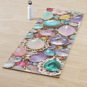 Pastel edelstenen en juwelen in roze en paars yogamat