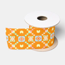 Pastel geometrisch pixelpatroon op levendig oranje satijnen lint