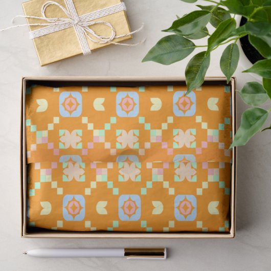 Pastel geometrisch pixelpatroon op levendig oranje tissuepapier (Geschenk)