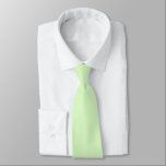 Pastel groene theeblad effen kleur stropdas<br><div class="desc">Stropdas business suit en casual leuke mode statement kleding accessoire bedrukt met Pastel Green Tea Leaf Solid Color grafische kunst ontwerpillustratie en selecteer producten collectie door TheFabricSeal print on demand shop op Zazzle.com #ZazzleMade https://www.zazzle.com/store/thefabricseal TheFabricSeal©️Original. Tea Green is een zachte, vrouwelijke, verfrissende, romantische, rustige, vrij neutrale en uitgebalanceerde gedempte groene...</div>