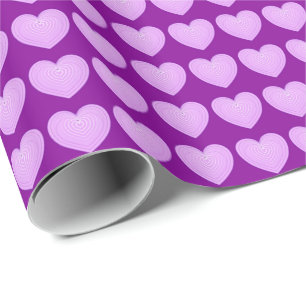 Pastel lavendel harten op een diepe paarse achterg cadeaupapier
