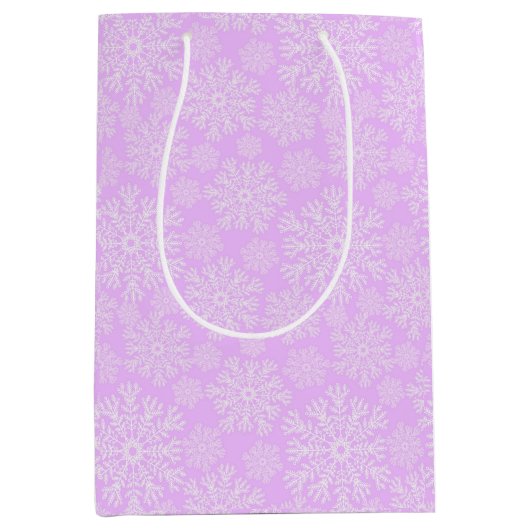 Pastel roze en witte kerst sneeuwvlokken patroon medium cadeauzakje (Voorkant)