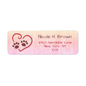 Pastel roze verf afdrukken op het retouradres etiket (Voorkant)