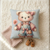 Pastel teddybeer met bloem en overall aan kussen