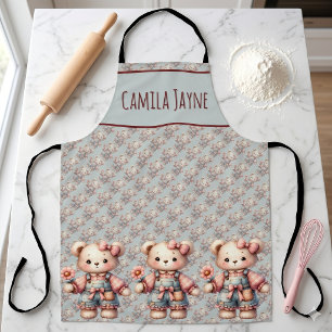 Pastel teddybeer met bloem en overall aan schort