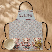 Pastel teddybeer met bloem en overall aan schort