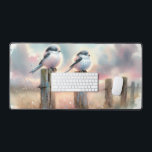 Pastel Watercolor Birds Fencepost Sunset Bureaumat<br><div class="desc">Soft watercolor brushwork captures two fluffy songbirds resting on weathered fence posts as a glowing sunset spreads across a dreamy countryside sky. Gentle washes of peach, blush pink, pale blue, and warm gold blend into a tranquil horizon, creating a calm pastoral atmosphere. The birds appear round and feathery, their delicate...</div>
