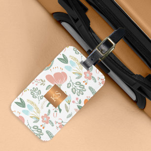 Pastel wilde bloemen met metallisch koper monogram bagagelabel