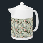 pastelbloem botanisch patroon theepot<br><div class="desc">Dit bloemmotief legt de tijdloze schoonheid van botanische illustraties vast met een zacht, romantisch tintje. Met delicate blozende rozen, witte madeliefjes, lavendeltakjes en blauwe wilde bloemen, is de compositie geplaatst tegen een rustgevende zacht groene achtergrond die de natuurlijke charme van elke bloei versterkt. Het palet leans in zachte pastels, waardoor...</div>