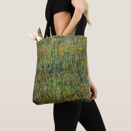 Pasture in Bloom door Vincent van Gogh Tote Bag (Dichtbij)
