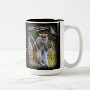 Patas Monkey op zwart Tweekleurige Koffiemok