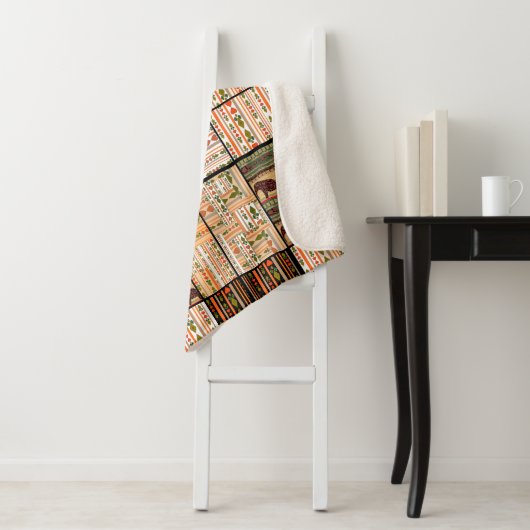 Patchwork seamless african ornamental pattern text sherpa deken (In situ)