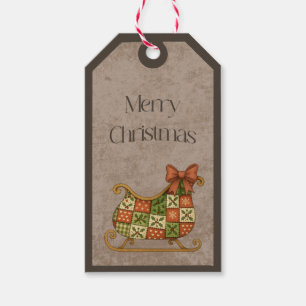 Patchwork slee in kerstkleuren cadeaukaartje cadeaulabel