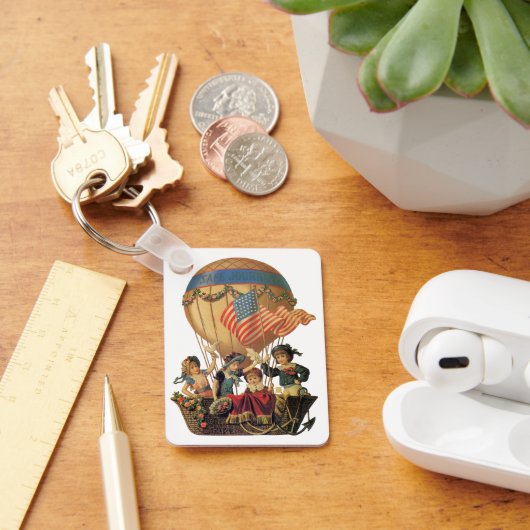 patriotticum, kinderen in een luchtballon sleutelhanger (Bureau)