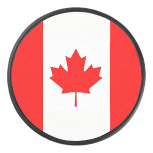 Patriottisch hockey puck met vlag van Canada