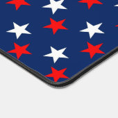 Patriottische patroonsterren op blauw bureaumat (Hoek)