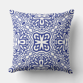 Patroon met blauw op wit kussen