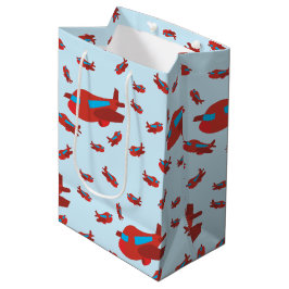 Patroon met rood en blauw vliegtuig medium cadeauzakje