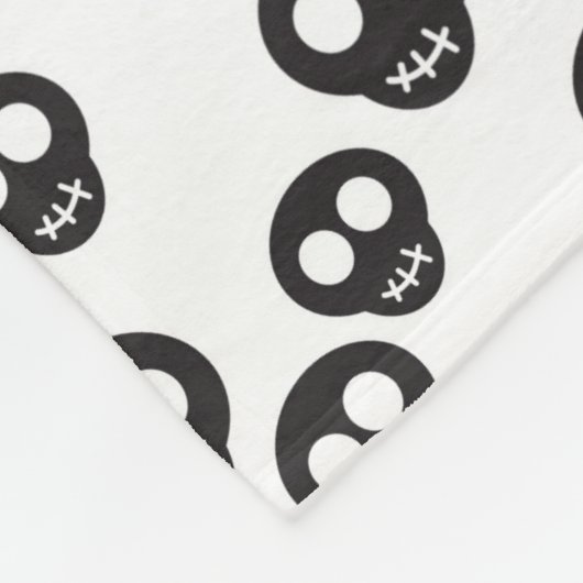 Patroon met zwarte schedels op wit fleece deken (Hoek)