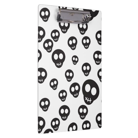 Patroon met zwarte schedels op wit klembord (Rechts)