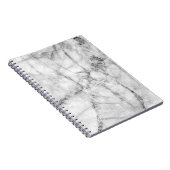 Patroon op de witte marmer vloerstructuur en op de notitieboek (Rechterzijde)