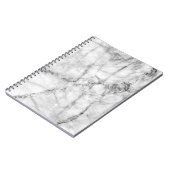 Patroon op de witte marmer vloerstructuur en op de notitieboek (Linkerzijde)