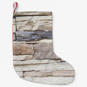 Patroon van de moderne stenen muur met een laag op kleine kerstsok
