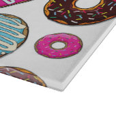 patroon van donuts, kleurrijke donuts, sproeten snijplank (Hoek)