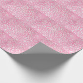 patroon van poedersuiker op roze cadeaupapier (Hoek)