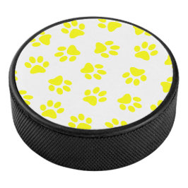 Patroon van poten, hondenpoten, gele poten hockey puck