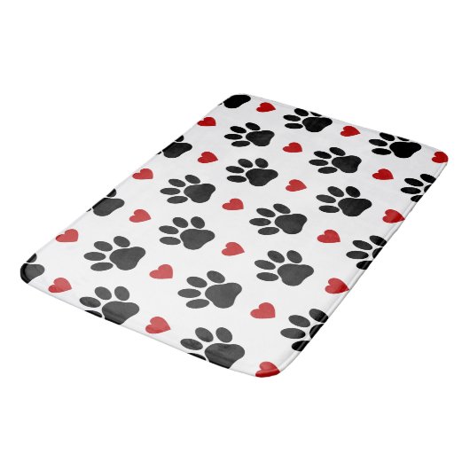 Patroon van poten, reuzenpoten, zwarte poten, rode badmat (Gekanteld)