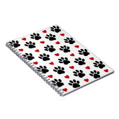 Patroon van poten, reuzenpoten, zwarte poten, rode notitieboek (Rechterzijde)