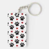 Patroon van poten, reuzenpoten, zwarte poten, rode sleutelhanger (achterkant)