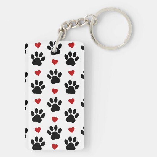 Patroon van poten, reuzenpoten, zwarte poten, rode sleutelhanger (achterkant)