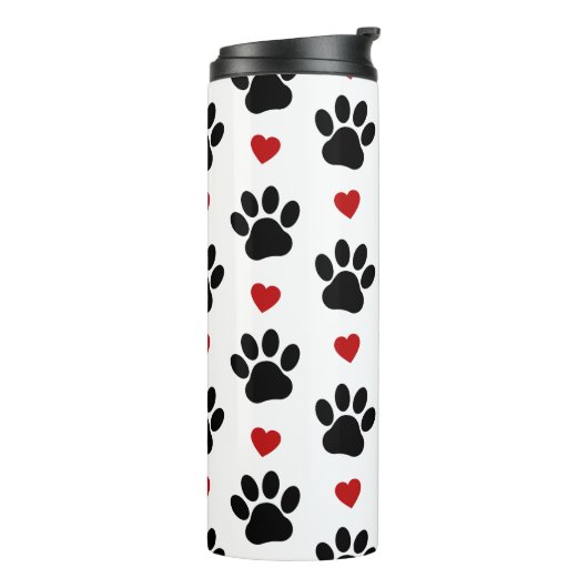 Patroon van poten, reuzenpoten, zwarte poten, rode thermosbeker (Gedraaid links)